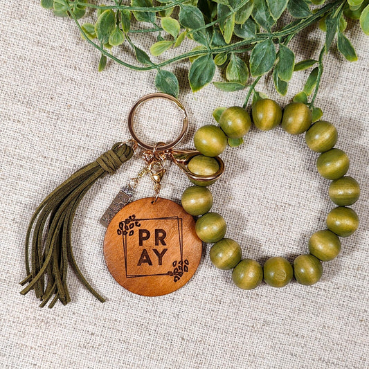 Pray Green Wood Bead Wristlet